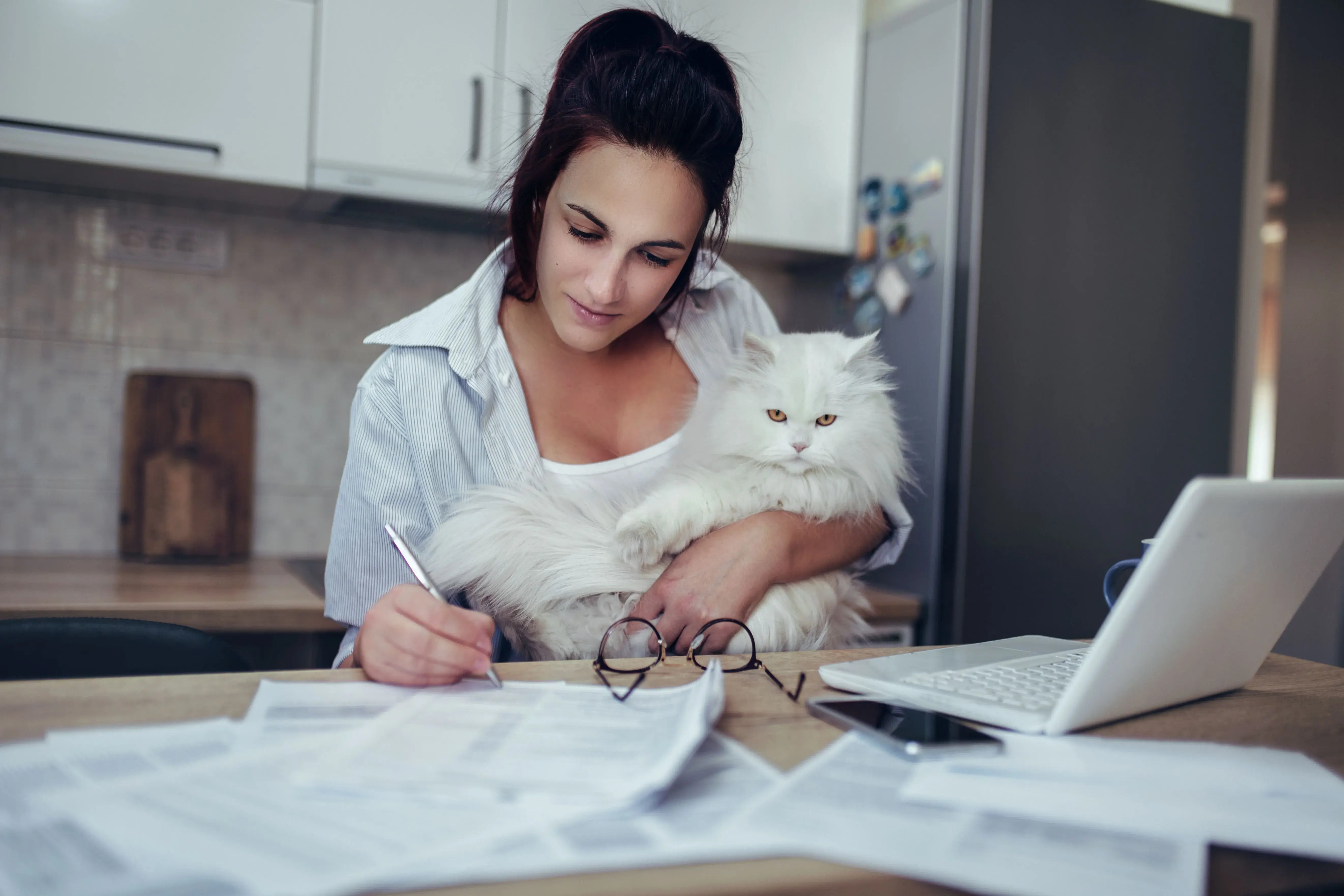 woman and cat at computer