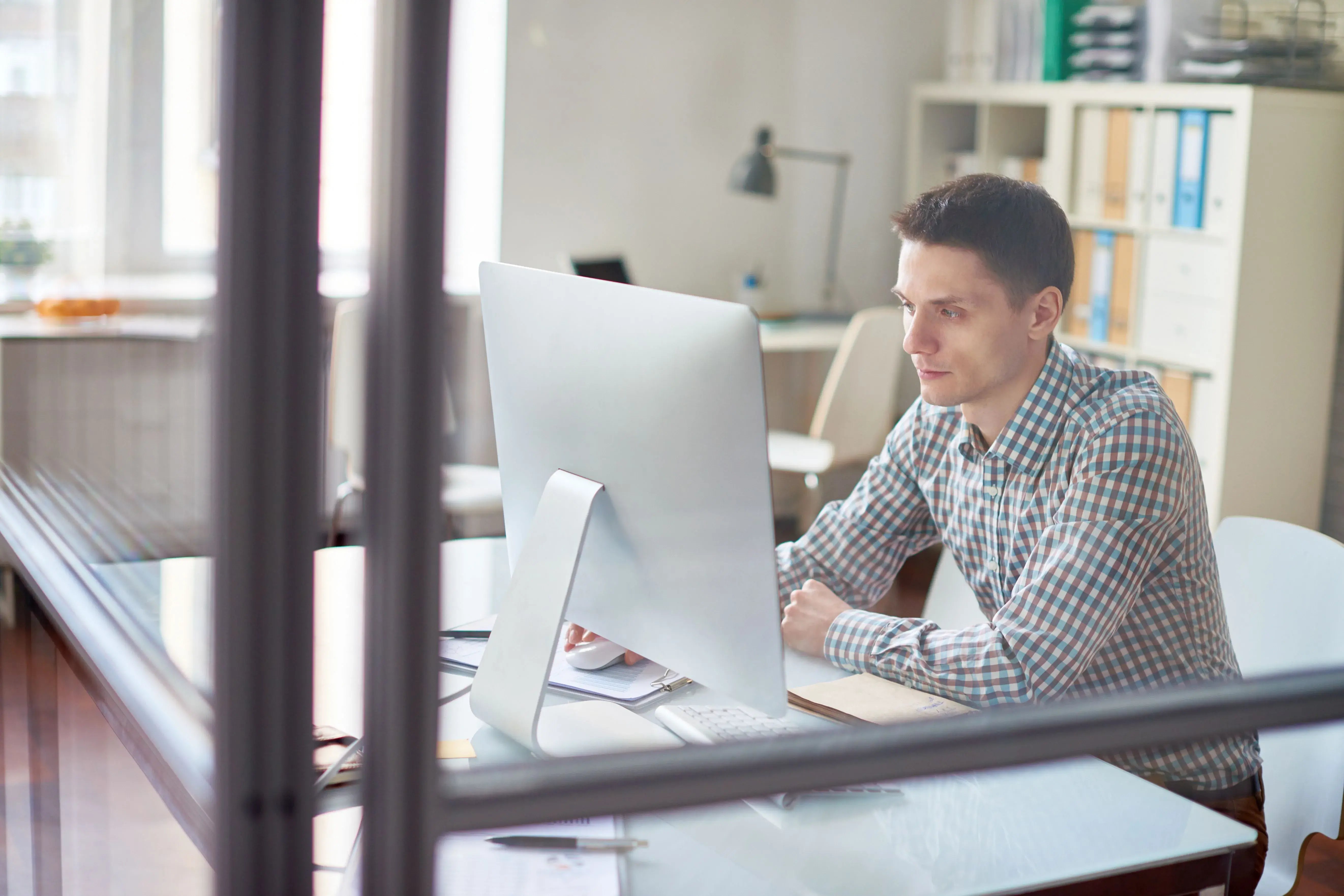 man on computer researching health