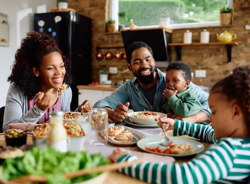 family having dinner happy