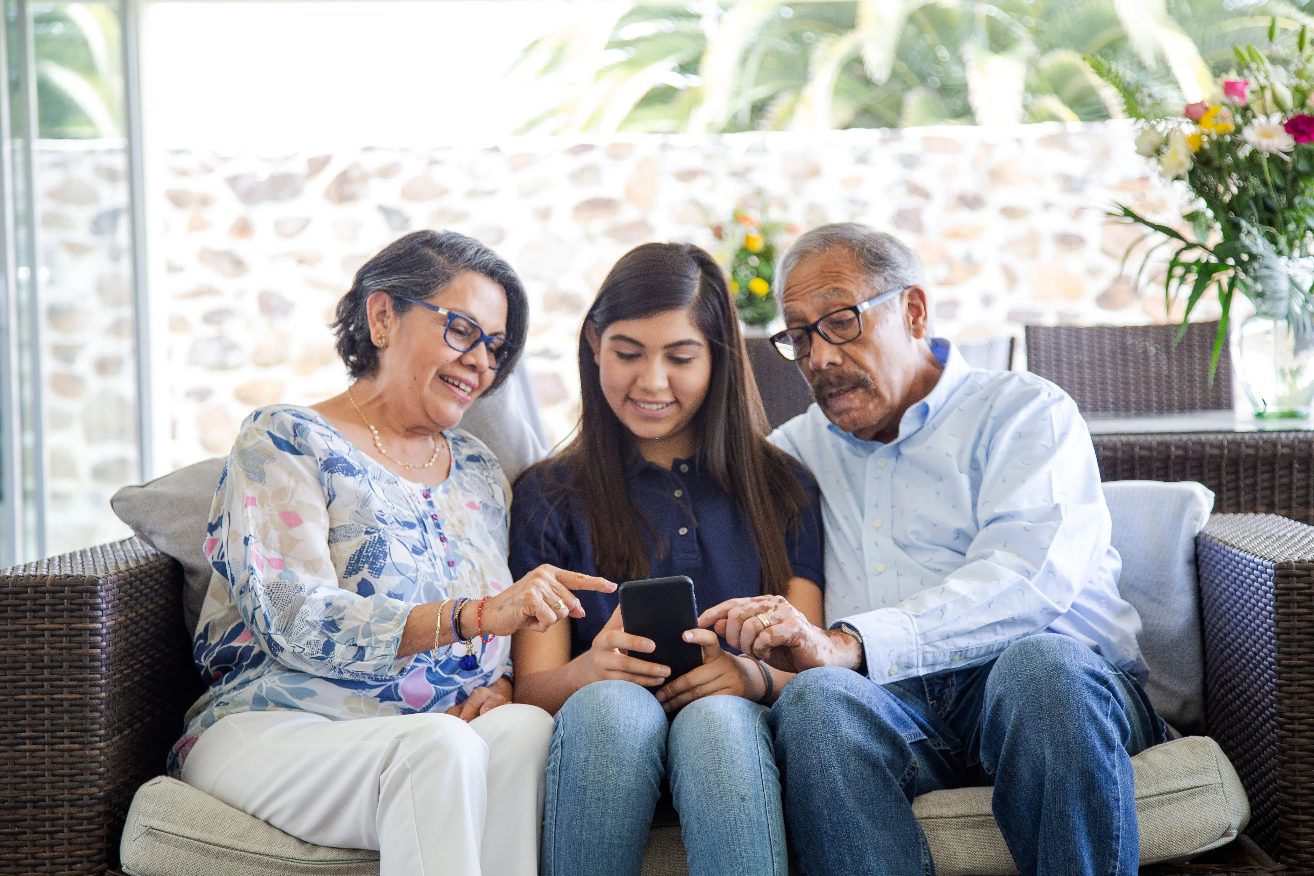 grandparents with grandaughter