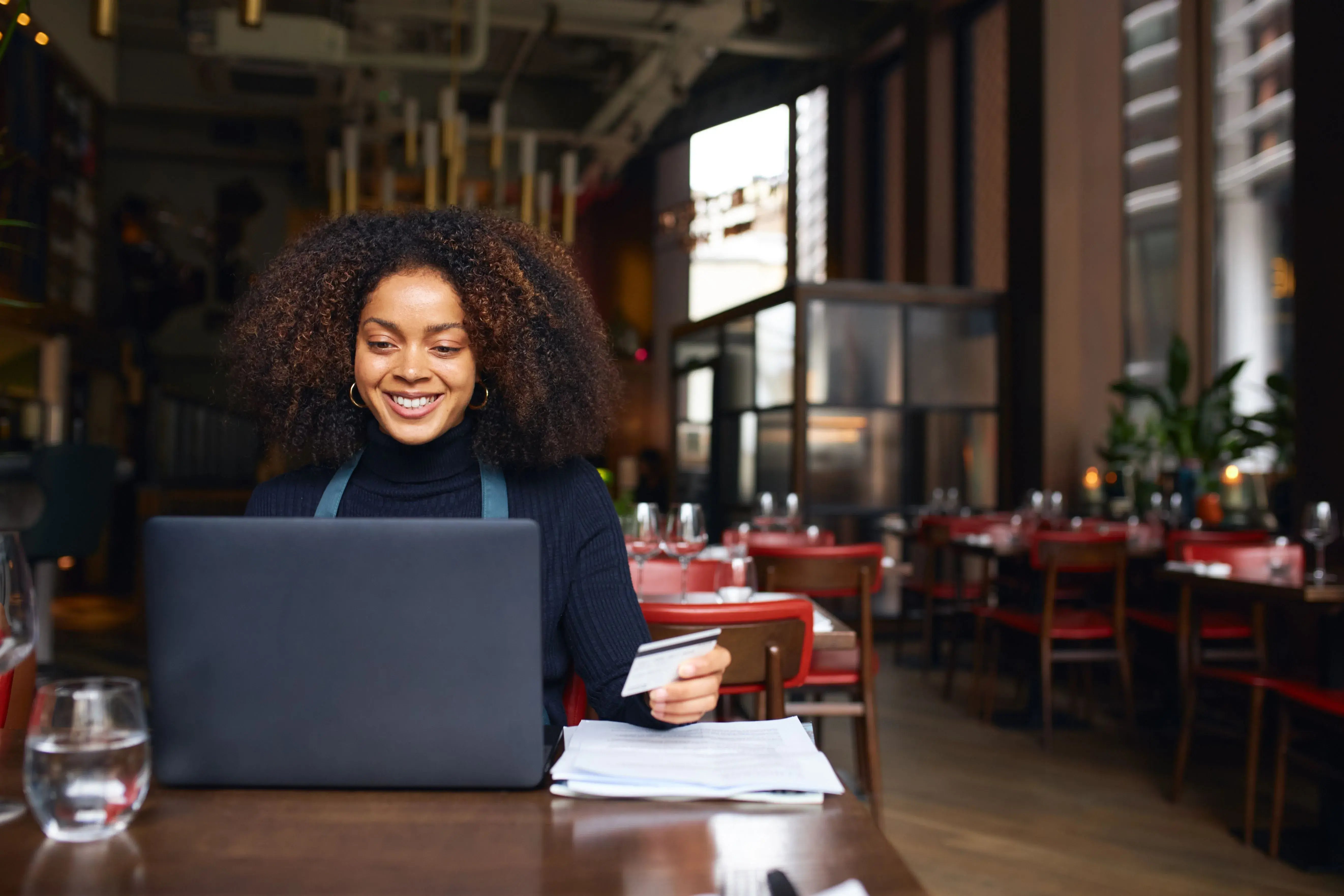 business owner female at laptop