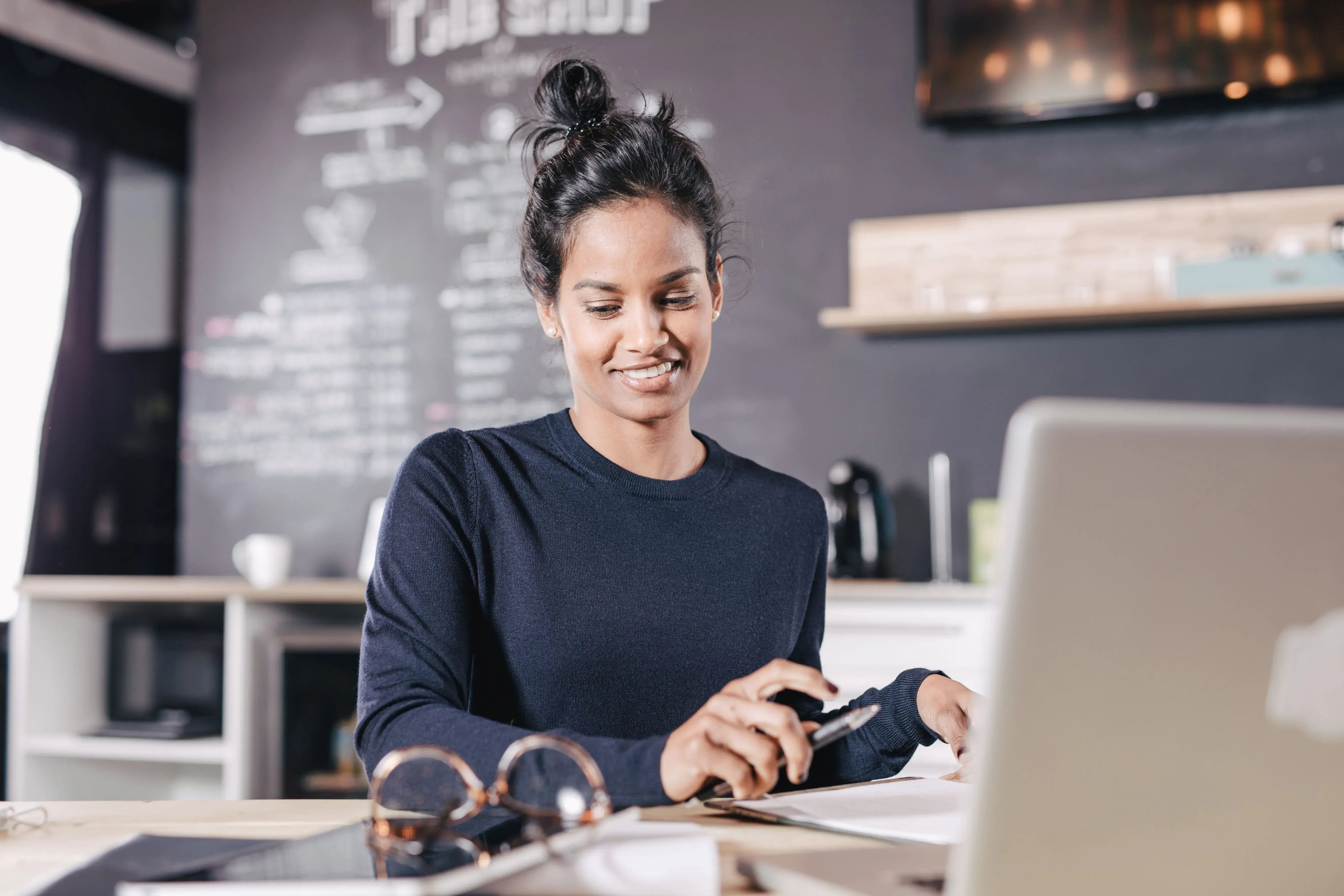 woman working on small business plan