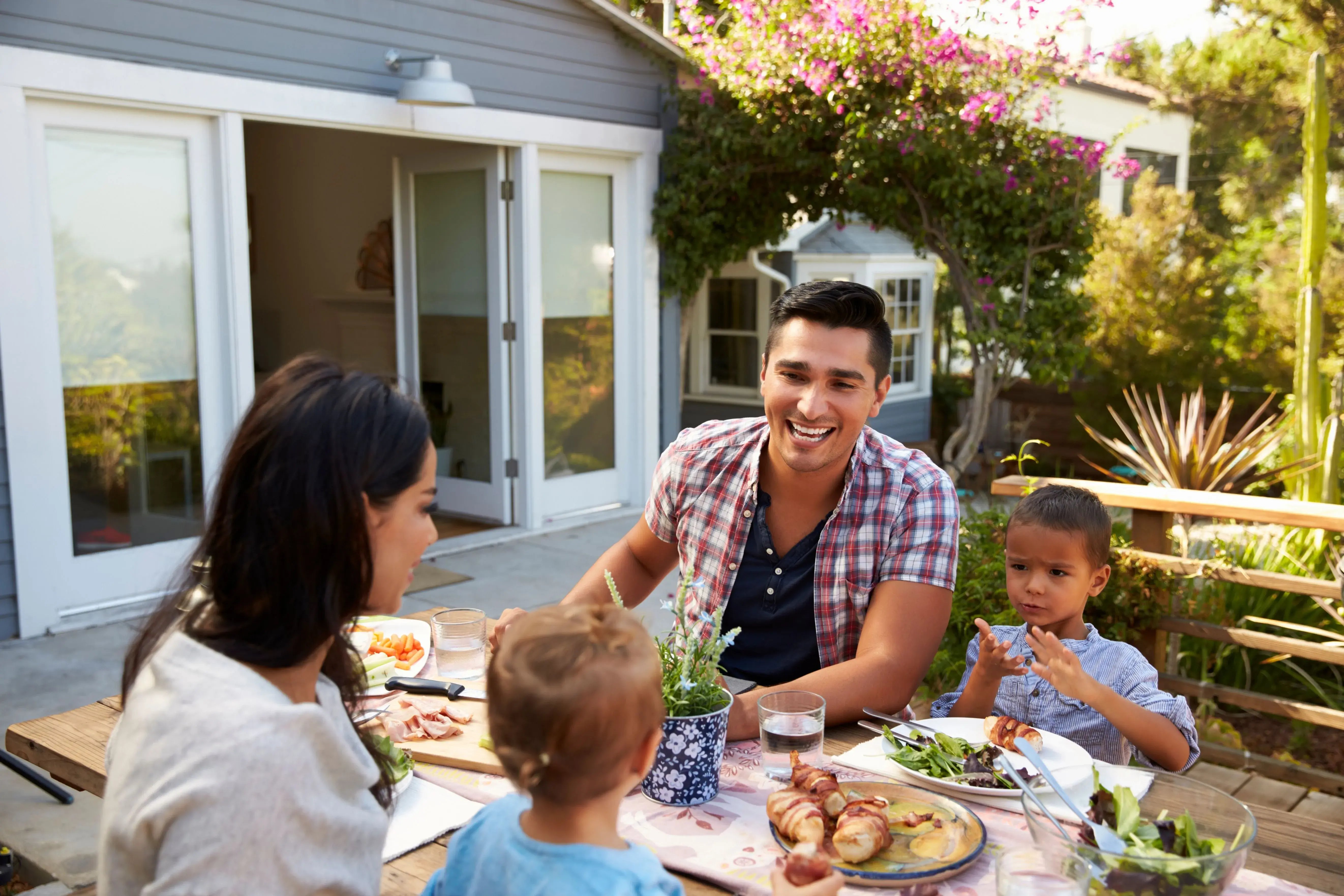 hispanic family eating outside