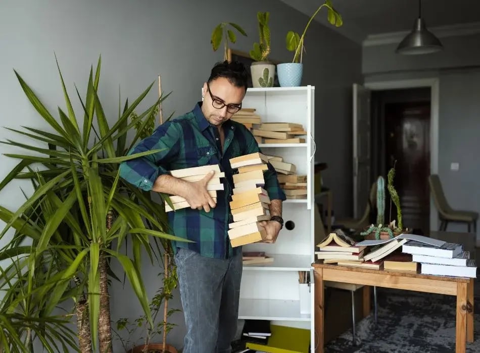 man organizing home