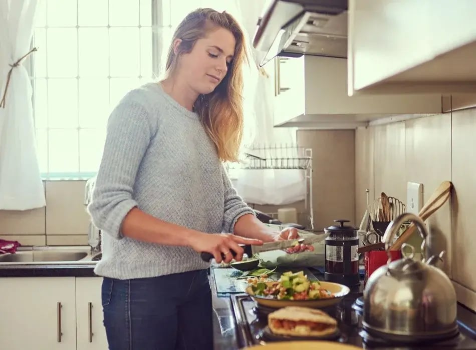 woman in kitchen cooking