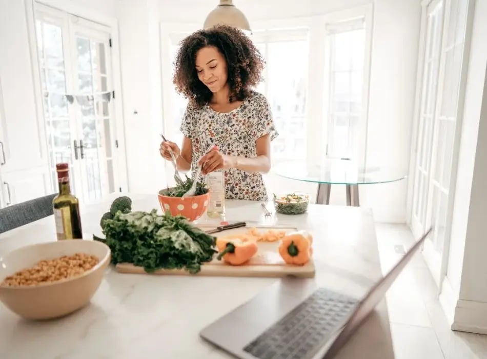 woman making a salad