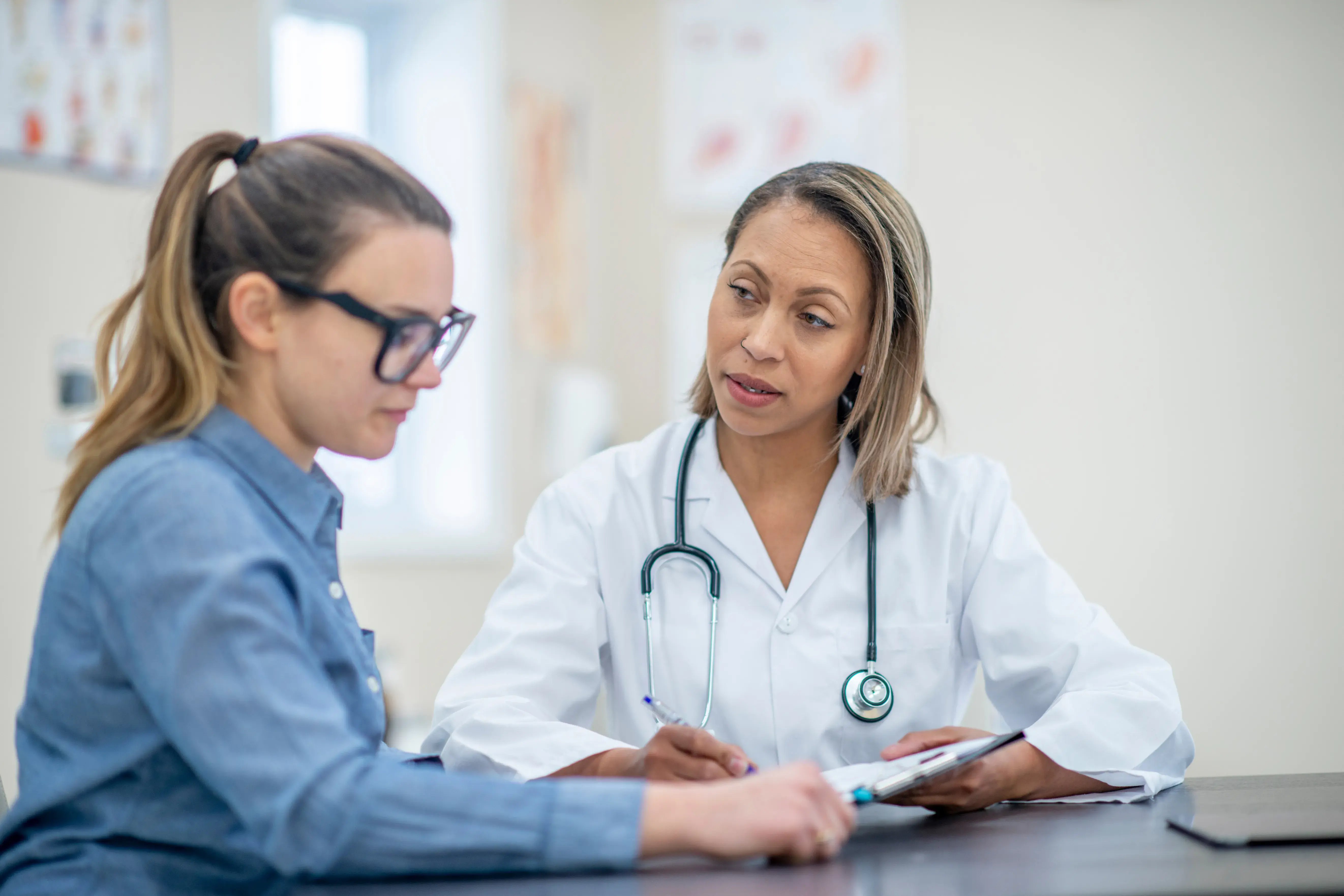 woman talking to her doctor