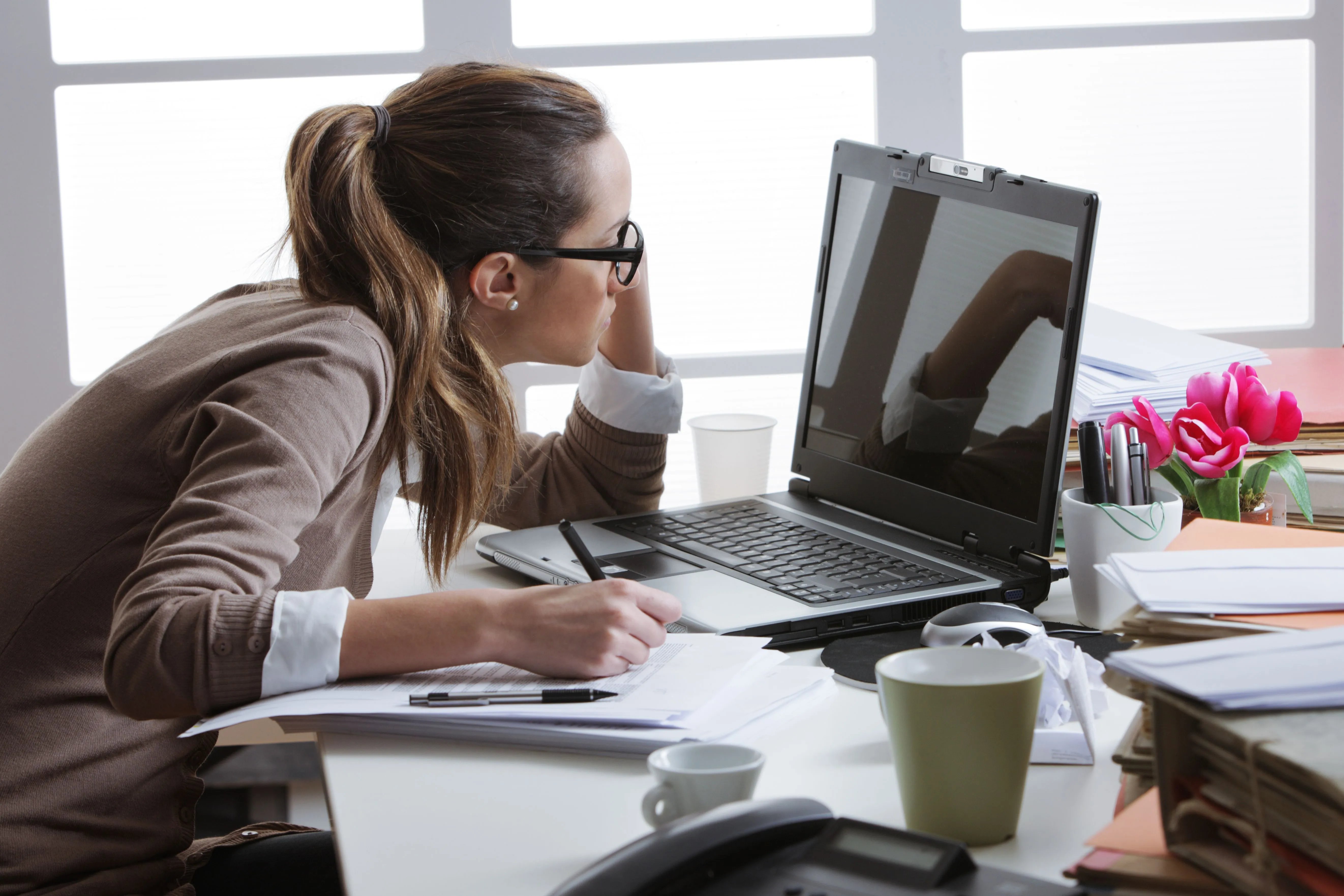 woman tired at desk